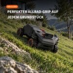 Navimow H5 Pro mit Allradantrieb an einer steilen Böschung – vier einzeln angetriebene Radnabenmotoren bewältigen bis zu 80 Prozent Steigung